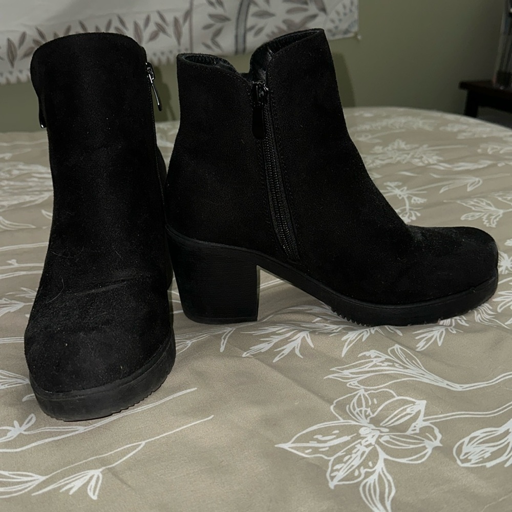 Women’s black zip up heeled booties